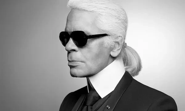 Chanel designer Karl Lagerfeld takes a bow at the end of his
