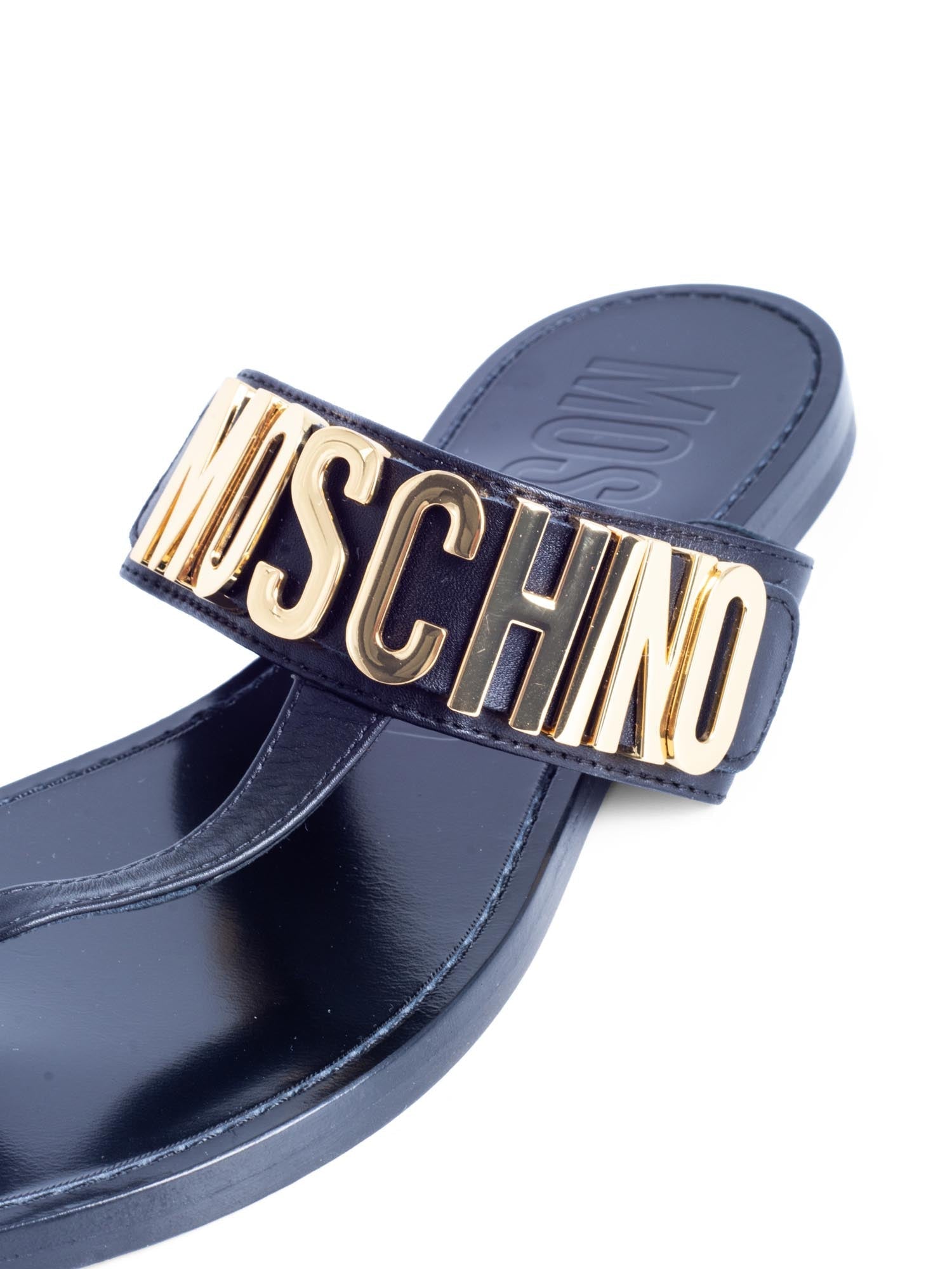 Moschino Logo Leather Slip On Sandals Black Gold moschino-logo-leather-slip-on-sandals-black-gold