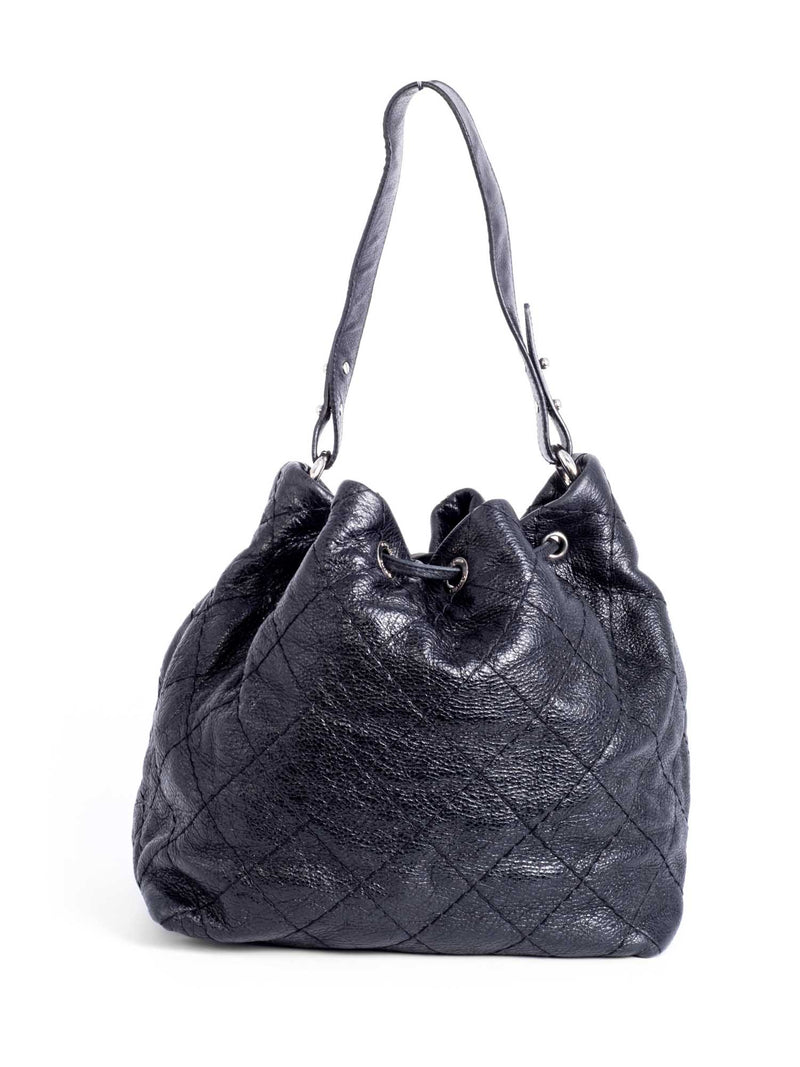 Chanel black bucket bag with logo on the front and gold detail - 1980s  second hand Lysis