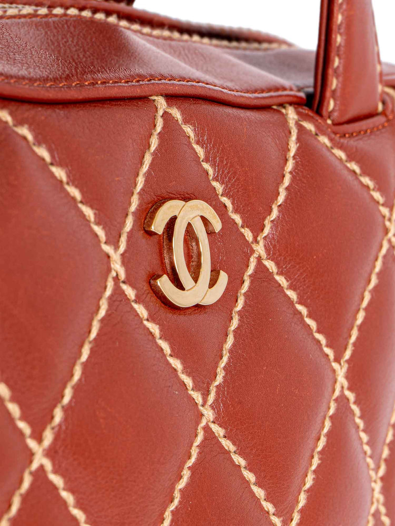 CHANEL Quilted Leather Surpique Bowler Bag Brown