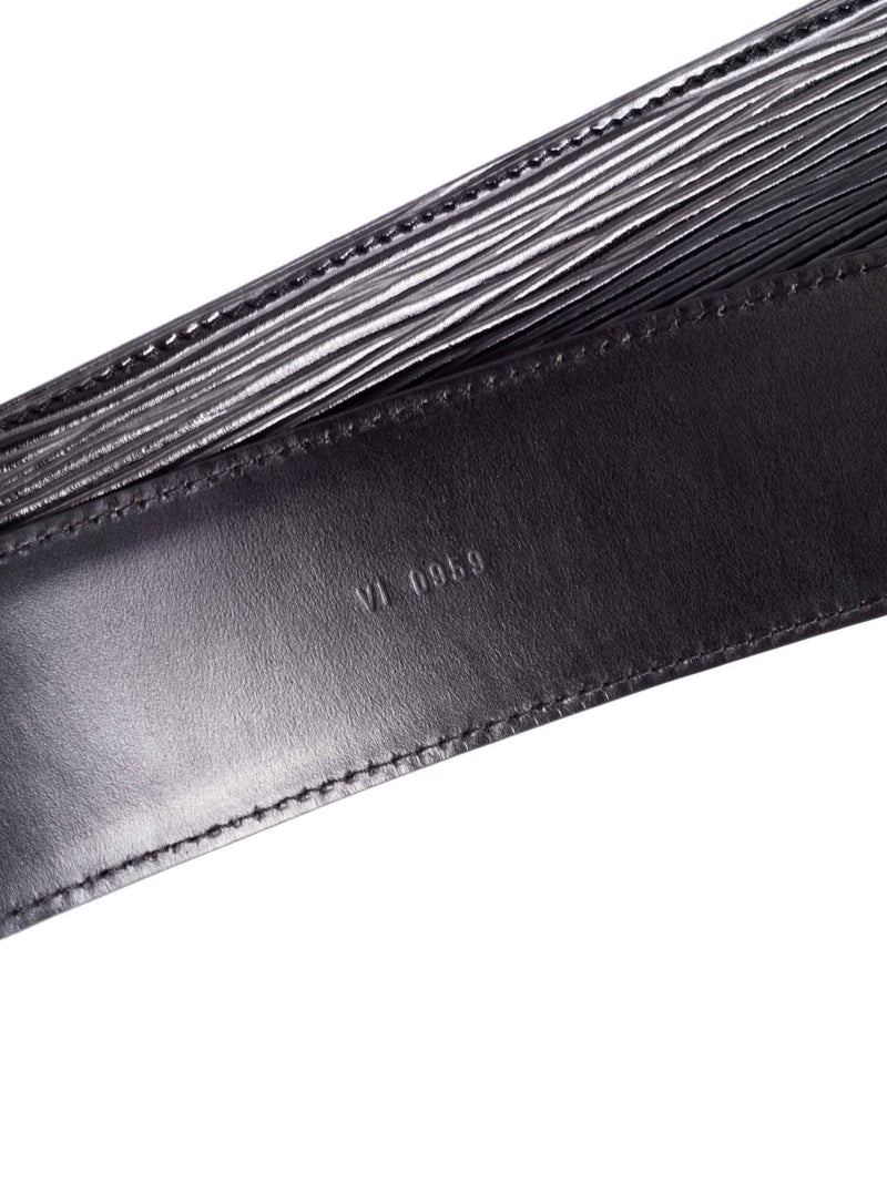 LOUIS VUITTON. Black epi leather belt, LV buckle in silv…