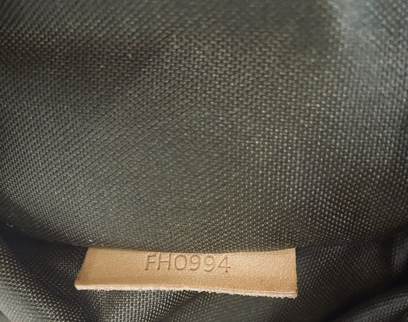 Louis vuitton garment bag online serial number