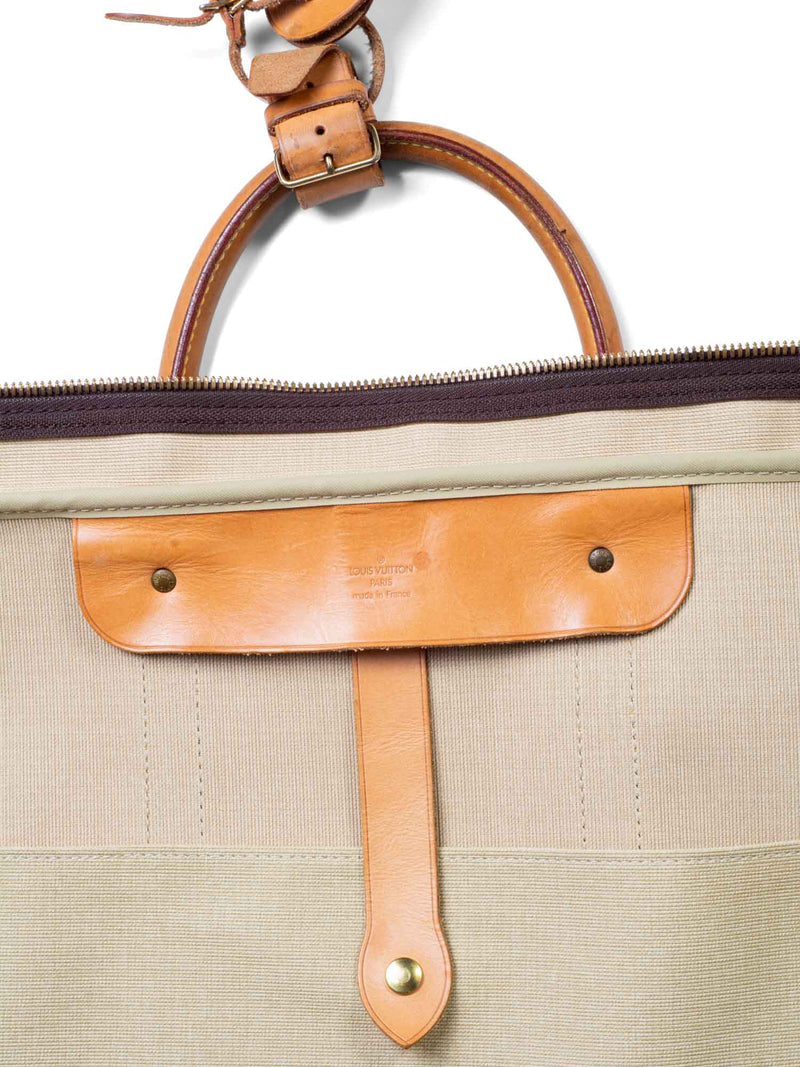 Vintage, Brown Louis-vuitton garment bag with leather strap